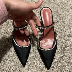 Black pointed toe heels with rhinestone detailing 