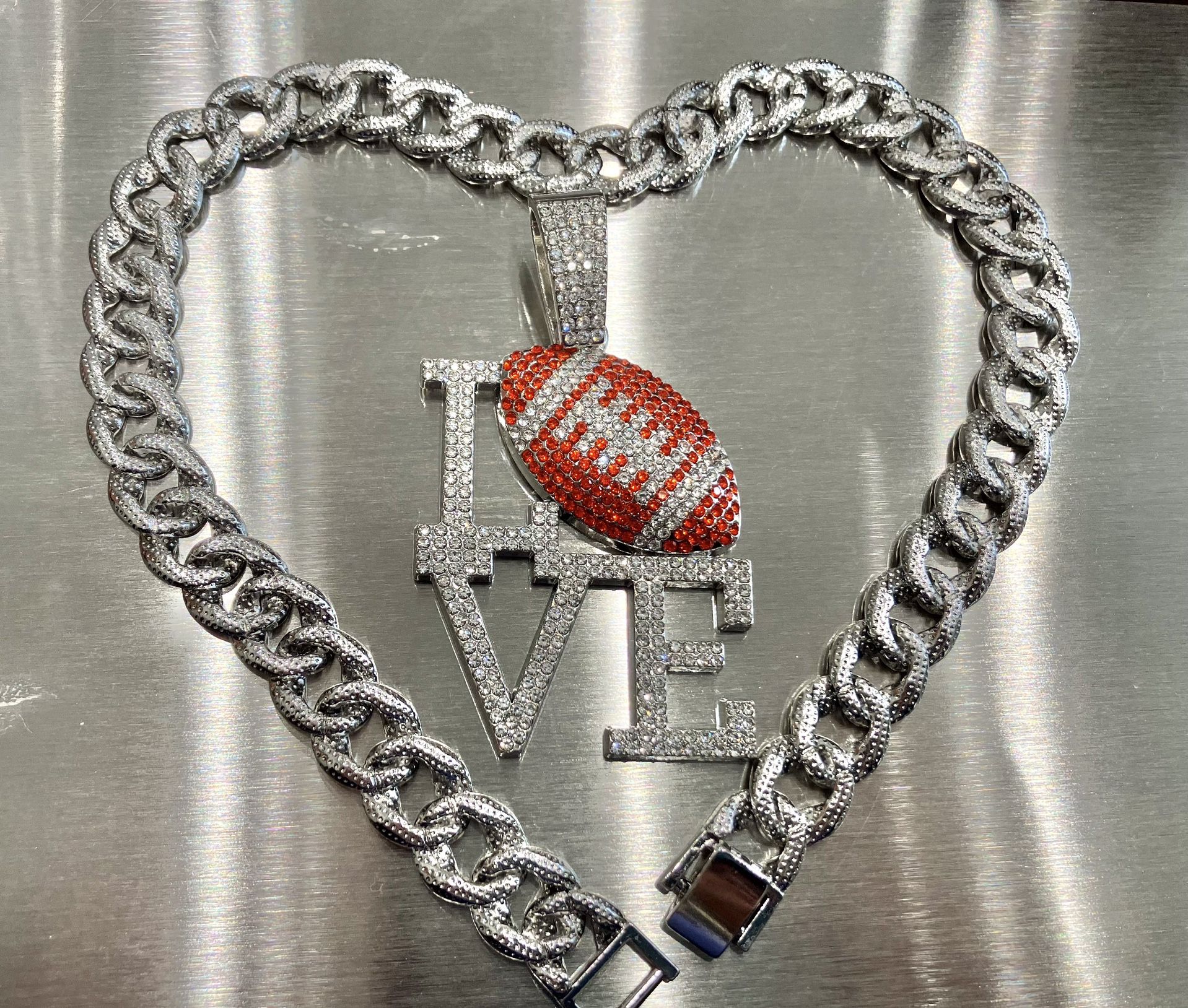 Love football rhinestone pendant & 18” cuban chain, longer chain length is available.