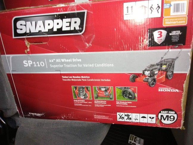 Snapper sp110 self-propelled lawn mower 22-inch cutting blade bag included