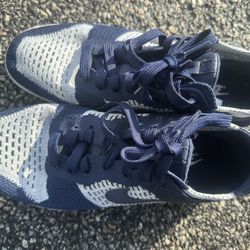 Nike Dunk Low Flyknit sneakers in the College Navy and Pure Platinum