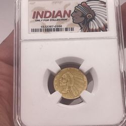 INDIAN COIN IN PROTECTIVE PLASTIC