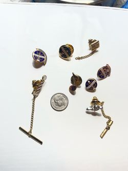 Lapel pins and tie clips from Barbershop