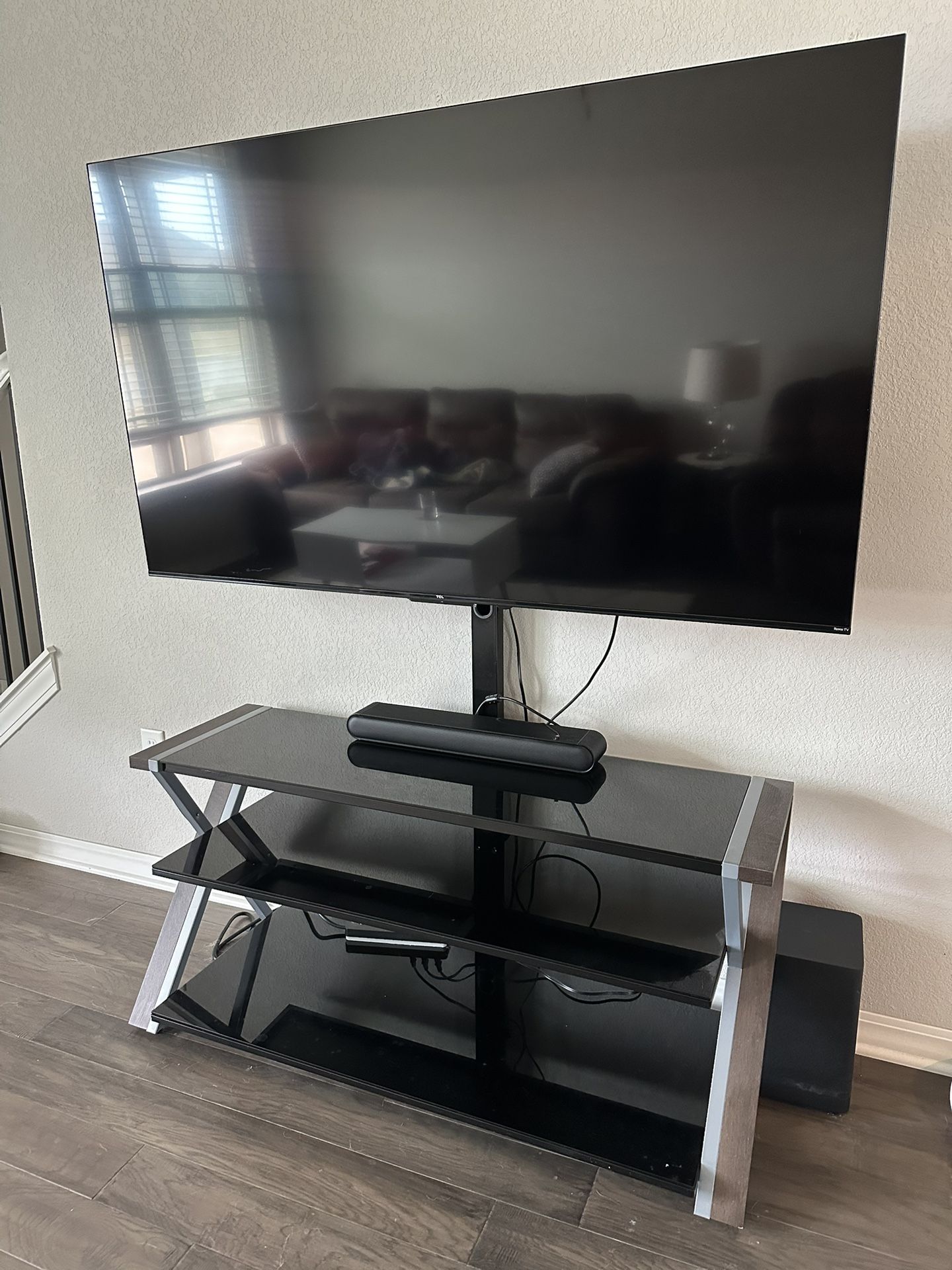 65” TCL Roku TV and sound bar/subwoofer, stand
