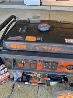 WEN 11,000-Watt 120V/240V Dual Fuel Portable Generator with Wheel Kit and Electric Start - Less than 3 hours operating time.  New battery.