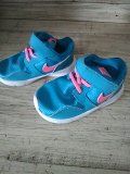 Baby girl Nikes size 5