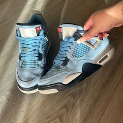 Authentic Air Jordan 4 Retro “University Blue” size 6Y