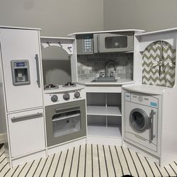 KidKraft's Ultimate corner Play Kitchen - white