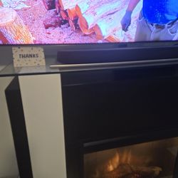 Modern electric fireplace with remote. With and black. Wide 53, height 43