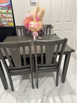 Gray table with chairs
