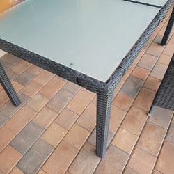 59"×36" table glass and Wicker mint condition q year old used inside lanai paid $699 plus tax(no chairs) reduced