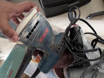 Bosch Palm Sander + Sanding Discs - $40