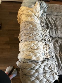 10 Dreamland Baby Weighted Swaddles and Sleep Sacks