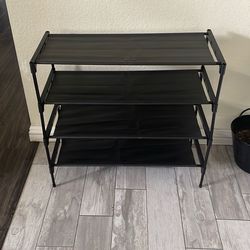 Black shoe rack new $10