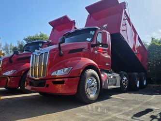 2022 PETERBILT 579 TRI-AXLE DUMP TRUCK WITH 100,000 LB HITCH