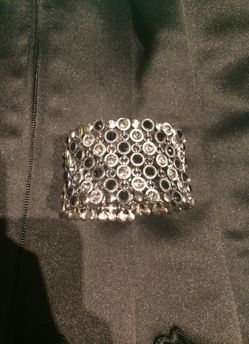 Brand New sparkly adjustable bracelet with black and grey sparkles.