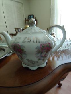 Ceramic 25th anniversary musical teapot