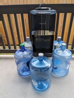 Primo Water Dispenser with Five 5-Gallon Bottles