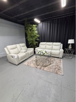 BRAND NEW! White Leather Reclining Sofa/Loveseat from Ashley Furniture. DELIVERY AVAILABLE!