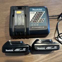 Makita Charter And Two 18v Batteries