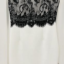 Women’s black lace and white sleeveless dress 