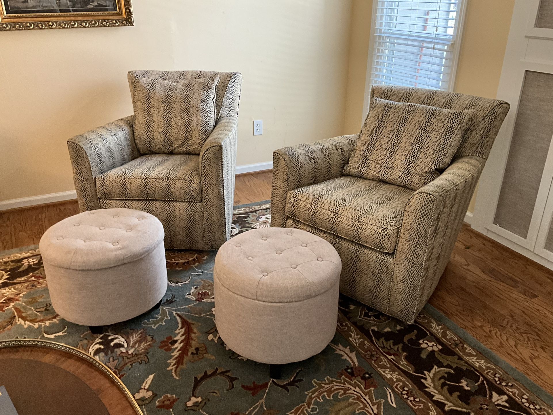 Pair Of Sam Moore Swivel Chairs With Storage Ottomans