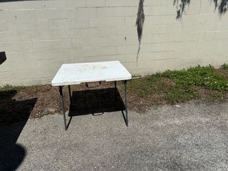 Table with handle to carry