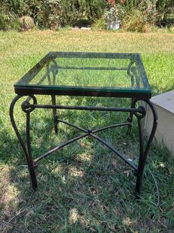 Glass black metal side table