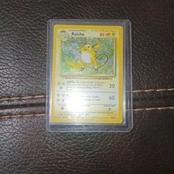 Raichu holographic card (14/102) from the 1999 Pokémon Base Set Unlimited edition