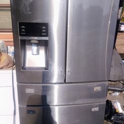 SAMSUNG STAINLESS STEEL 4 DOOR WITH ICE DISPENSER 