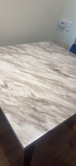 Faux marble table - slight slight damage