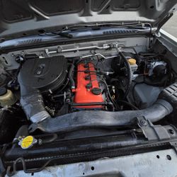 Nissan frontier 2003 2.4 std  color gris