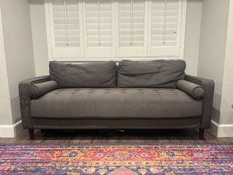 Grey sofa with tufted seat, seats 3-4