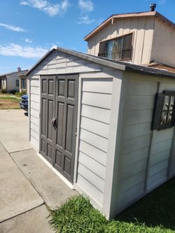 SUNCAST Large 10 foot wide by 12 feet long outdoor hard resin hard plastic storage shed