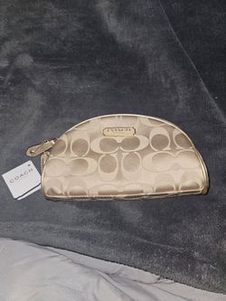 Coach estee Lauder, collab limited edition makeup bag.