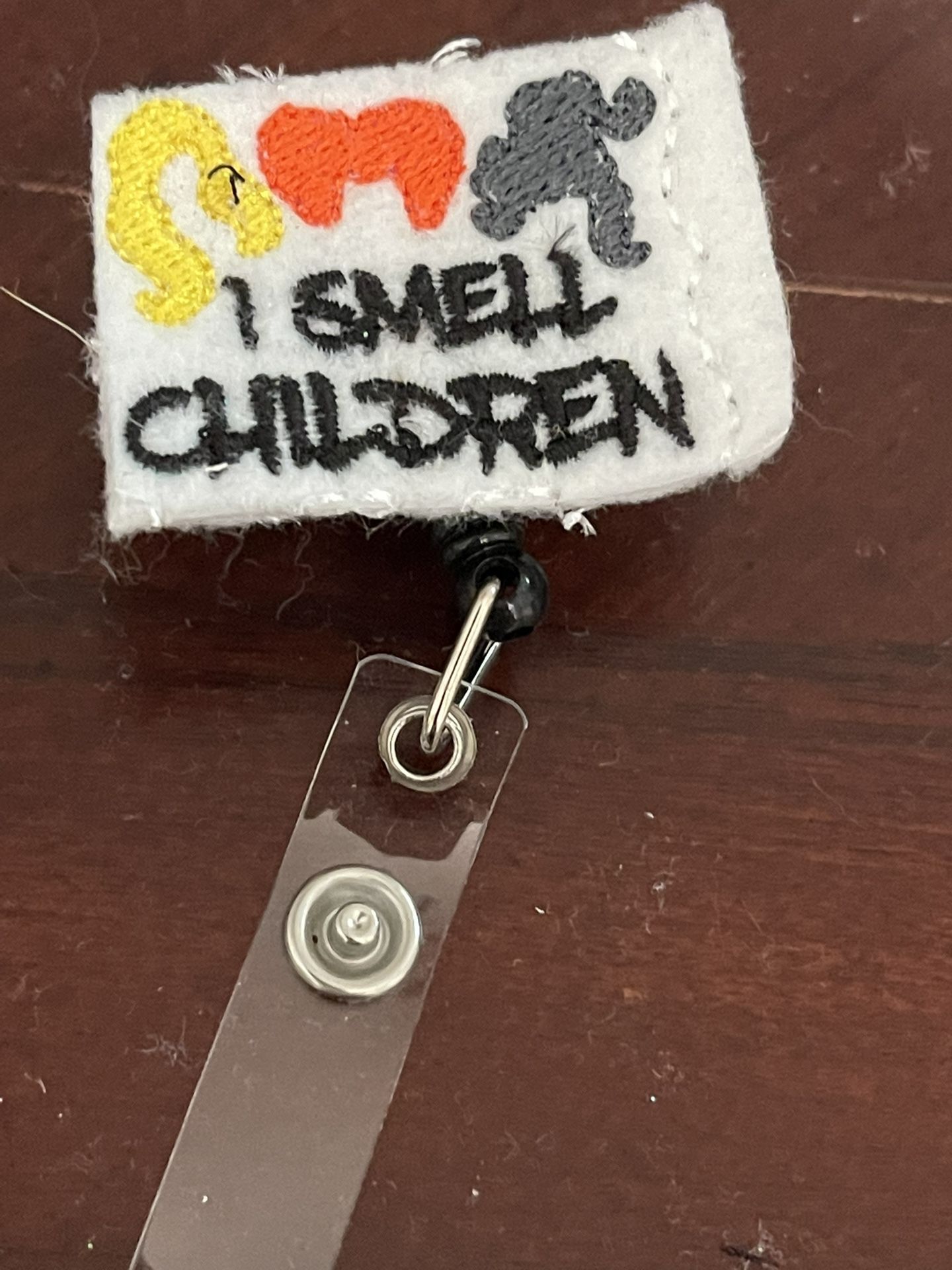 I Smell Children Badge Reel
