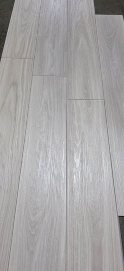 Beautiful Vinyl Planking Flooring Easy To Install With Attached Padding.