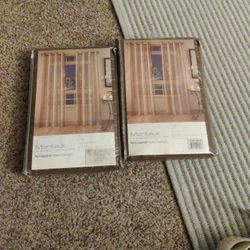 a pair 53x84 sheer curtains