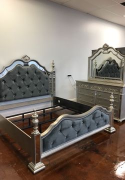 Dresser mirror and queen bed