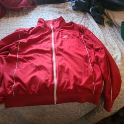Red Nike parachute sweater