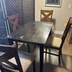 Dining table and 4 chairs
