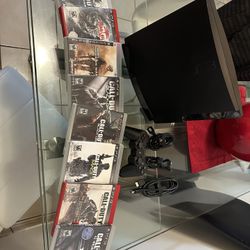 PS3 Slim + Games 