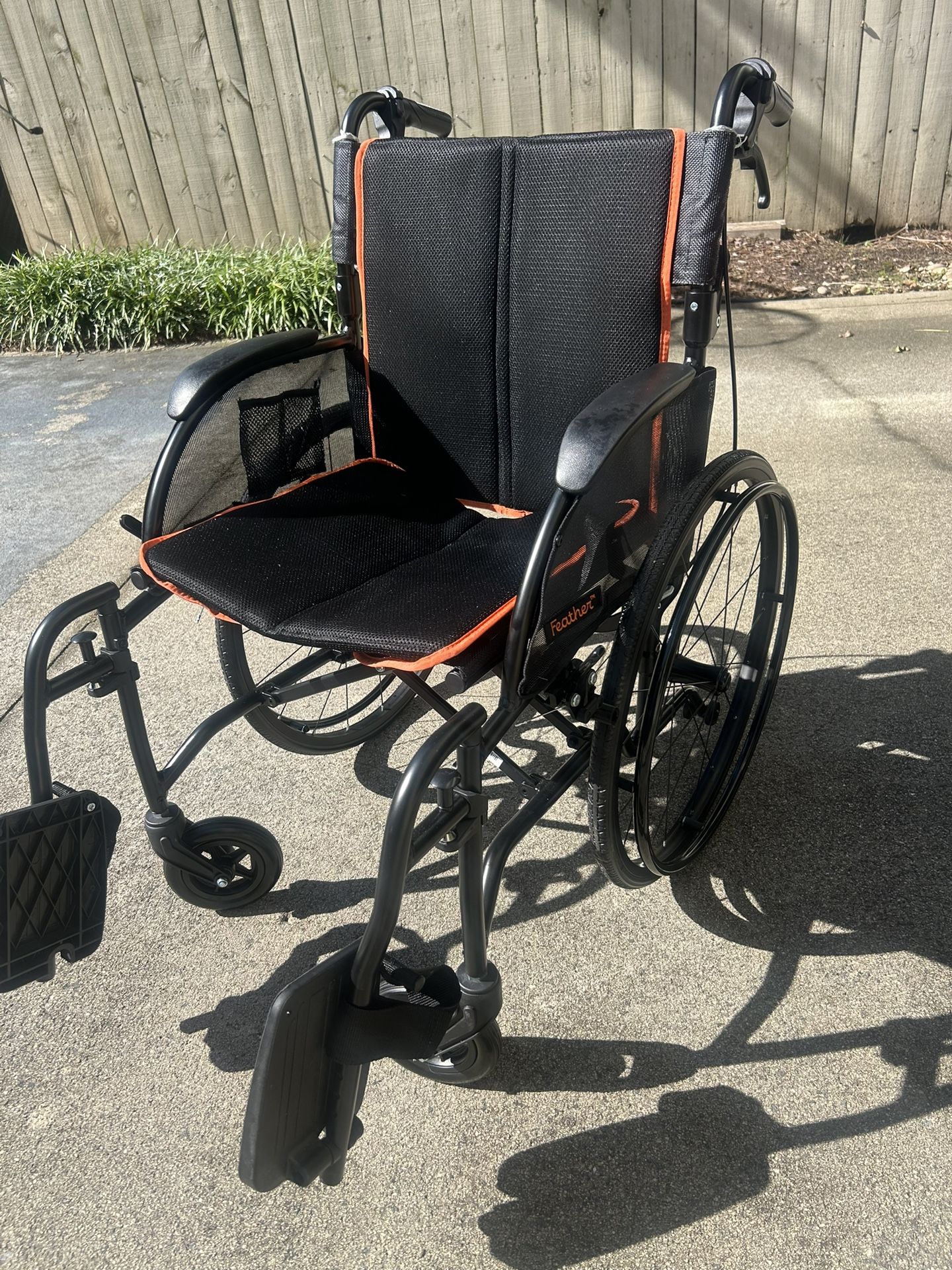 Wheelchair- Feather Brand 