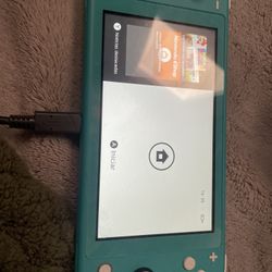 Nintendo Switch Lite + Atari Game