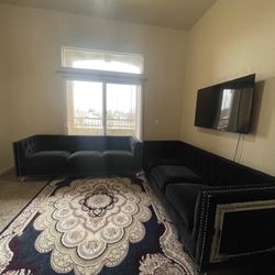 2 Sets Of Black Couches