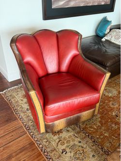 Two all leather swivel chairs
