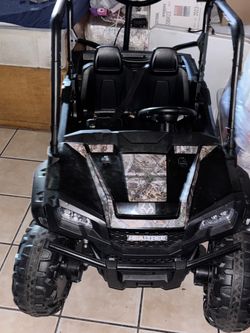 Realtree XD 24V Battery-Powered Ride-On UTV for Kids with Remote Control, Lights and Sounds