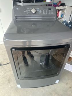 Barely used LG 7.3 cu. ft. Vented Electric Dryer in Middle Black with Sensor Dry Technology