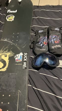 Snowboard, gloves, and goggles