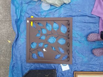 Hanging tea light candle holder