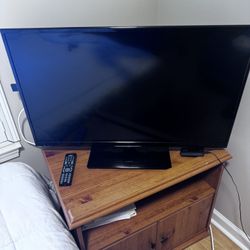 TV, full size bed, office chair, lamps, powered recliner chair, printer and pictures